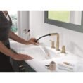champagne-bronze-delta-widespread-bathroom-faucets-35849lf-czpd-e1_1000