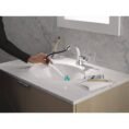chrome-delta-single-hole-bathroom-faucets-15840lf-pd-e1_1000